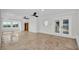 Large bonus room featuring tile floors, a sauna, and double doors leading to the pool at 390 Windermere Dr, Lakeland, FL 33809