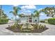 Beautiful two-story home featuring a water fountain, modern front door, and a spacious driveway at 390 Windermere Dr, Lakeland, FL 33809