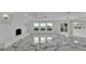 Living room with fireplace, lots of natural light and views to a beautiful outside space at 390 Windermere Dr, Lakeland, FL 33809