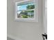 Bright room featuring a window that provides natural light and neighborhood views at 390 Windermere Dr, Lakeland, FL 33809