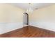Dining room featuring wood floors and a chandelier at 6898 Glenbrook Dr, Lakeland, FL 33811