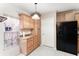 Bright kitchen featuring wooden cabinets and stainless steel appliances at 6898 Glenbrook Dr, Lakeland, FL 33811