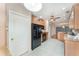 Bright kitchen featuring stainless steel appliances and wooden cabinets at 6898 Glenbrook Dr, Lakeland, FL 33811