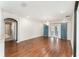 Bright living room featuring wood floors and french doors at 6898 Glenbrook Dr, Lakeland, FL 33811