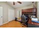 Bedroom features closet with mirrored doors and vaulted ceiling at 8360 Lake Amhurst Trl, Orlando, FL 32829