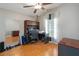 Bedroom includes desk with storage and shelving and mirrored wall at 8360 Lake Amhurst Trl, Orlando, FL 32829