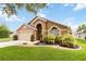 Attractive single-Gathering home with a manicured lawn and a neutral color scheme at 8360 Lake Amhurst Trl, Orlando, FL 32829