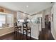 Bright kitchen featuring white cabinets, stainless appliances and granite countertops at 8360 Lake Amhurst Trl, Orlando, FL 32829