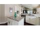Open kitchen featuring granite counters, stainless steel appliances, and ample cabinet space at 8360 Lake Amhurst Trl, Orlando, FL 32829
