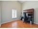 Office space includes wood floors, a built in desk and storage cabinet at 8360 Lake Amhurst Trl, Orlando, FL 32829