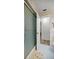Bathroom featuring a shower with glass doors at 9530 Sw 189Th Ct, Dunnellon, FL 34432