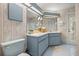 Bathroom featuring a vanity with ample counter space, toilet, and blue tile floor at 9530 Sw 189Th Ct, Dunnellon, FL 34432