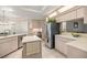Well-lit kitchen with lots of cabinet space and stainless appliances, perfect for cooking and gathering at 9530 Sw 189Th Ct, Dunnellon, FL 34432