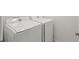 Laundry room featuring new front load Samsung washer and dryer machines at 109 James Cir, Lake Alfred, FL 33850