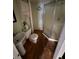 Bathroom featuring cabinet sink, toilet and a shower with glass doors at 408 S Orange Ave, Fort Meade, FL 33841