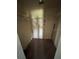 Walk-in closet featuring shelving and adequate storage space for organizing belongings and maximizing space at 408 S Orange Ave, Fort Meade, FL 33841