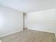 Spacious living room with wood-look tile floors at 34 Aaron Cir, Ormond Beach, FL 32174