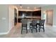 Modern kitchen with stainless steel appliances and granite countertops at 1509 Venice Ln, Davenport, FL 33896