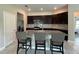 Modern kitchen with stainless steel appliances and granite countertops at 1509 Venice Ln, Davenport, FL 33896