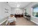 Bright office space with massage table, desk, and natural light at 10298 Sw 96Th Loop, Ocala, FL 34481