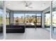 Screened patio with a hot tub and views of the property at 10298 Sw 96Th Loop, Ocala, FL 34481