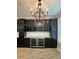 Elegant bar area featuring built-in wine storage, beverage cooler, and sleek countertop at 1521 Sourwood Dr, Ocoee, FL 34761