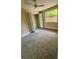 Cozy bedroom with a closet and natural light from the window at 1923 Beechwood Dr, Lakeland, FL 33803