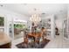 Bright dining room with built-in shelves and access to the home's living spaces at 2110 Reaney Rd, Lakeland, FL 33803