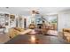 Open living area featuring tile floors, updated lighting, and a dining area at 2110 Reaney Rd, Lakeland, FL 33803