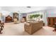 Spacious living room with comfortable seating and elegant decor, perfect for entertaining guests at 2110 Reaney Rd, Lakeland, FL 33803
