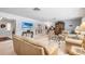 Elegant living room with classic furnishings and a view to other rooms in the home at 2110 Reaney Rd, Lakeland, FL 33803