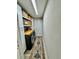 Functional laundry room with modern washer and dryer, wood countertop, and storage at 4128 Palo Alto Dr, Lakeland, FL 33813