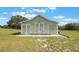 Exterior view of the barn, featuring ample storage space and a well-maintained appearance at 21551 Lake Seneca Rd, Eustis, FL 32736