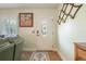 Cozy entryway with a decorative front door, tiled flooring, and a unique coat rack for added functionality at 21551 Lake Seneca Rd, Eustis, FL 32736