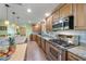 Beautiful kitchen with stainless steel appliances, granite countertops, and ample cabinet space at 21551 Lake Seneca Rd, Eustis, FL 32736