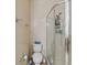 This bathroom includes a shower, toilet, and towel rack, offering practical amenities at 5935 Tivoli Gardens Blvd, Orlando, FL 32829