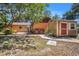 Backyard area featuring a patio with a table and chairs, plus a shed at 1625 Itchepackesassa Dr, Lakeland, FL 33810