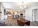 Open-concept layout with seamless flow between the kitchen, dining area, and living room space at 1625 Itchepackesassa Dr, Lakeland, FL 33810