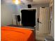 Bedroom with a large dresser and a gray accent wall at 606 Lakespur Ln, Altamonte Springs, FL 32714