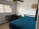 Bedroom with a desk, chair, and a view of the backyard at 606 Lakespur Ln, Altamonte Springs, FL 32714