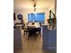 Bright dining room featuring a large table and sliding glass doors at 606 Lakespur Ln, Altamonte Springs, FL 32714