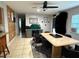 Casual dining area with a desk and workspace near the dining table at 606 Lakespur Ln, Altamonte Springs, FL 32714