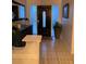 Welcoming entryway with decorative console table and tiled flooring at 606 Lakespur Ln, Altamonte Springs, FL 32714