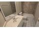 Cozy bathroom featuring a single sink, a toilet and a shower-tub combo at 1416 Silverthorn Dr, Orlando, FL 32825