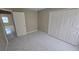 This bedroom features tile floors, double door closet, and neutral walls at 1416 Silverthorn Dr, Orlando, FL 32825