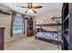 bedroom with bunk beds, dresser and shelf, and window with decor at 2921 Se 38 Pl, Ocala, FL 34480