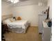 Simple bedroom decor with soft neutral decor featuring a bed and dresser at 2921 Se 38 Pl, Ocala, FL 34480