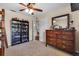 Spacious bedroom featuring a bunk bed, dresser, shelving and a neutral color palette at 2921 Se 38 Pl, Ocala, FL 34480