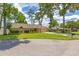 Lovely single-story home with a well-kept lawn, mature trees, and convenient garage access at 2921 Se 38 Pl, Ocala, FL 34480