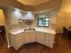 Bright and clean kitchen featuring white cabinetry, countertops, and modern appliances at 2921 Se 38 Pl, Ocala, FL 34480